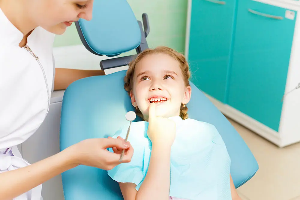 Little girl at the dentist
