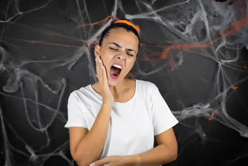 Woman with a Toothache on Halloween